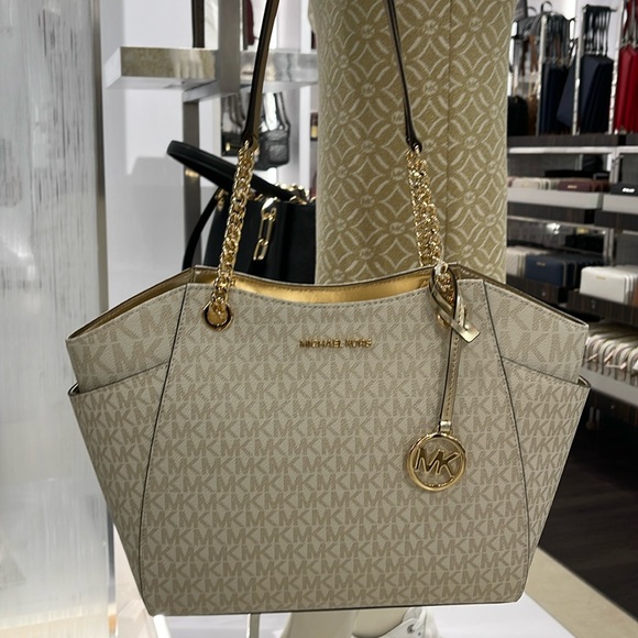 MICHAEL KORS 
Jet Set Travel Large Signature Chain Shoulder Tote Bag
Pale Gold - Picture 11 of 16